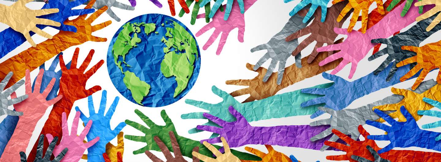 Individuals of different ethnicities hands and an illustration of the world